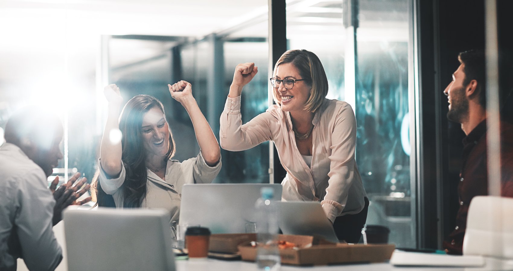 Team celebrating success in meeting