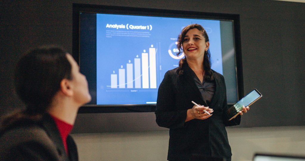 Business woman presenting in meeting
