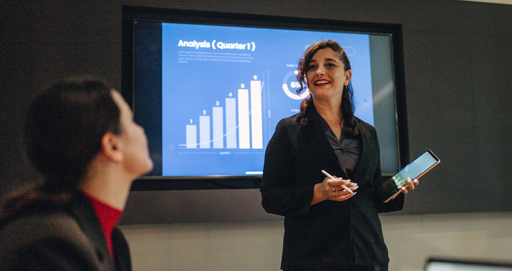 Business woman presenting in meeting
