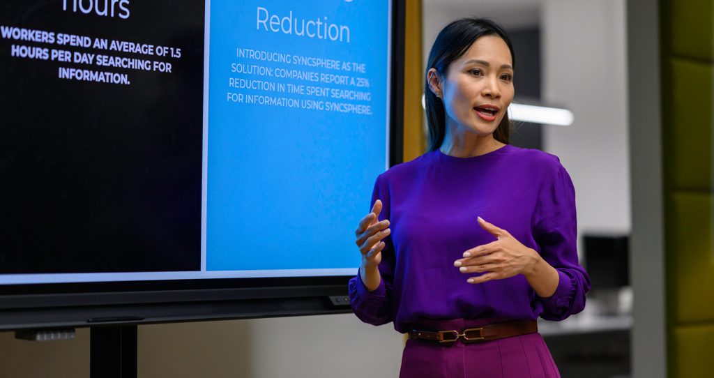 Businesswoman giving presentation in meeting
