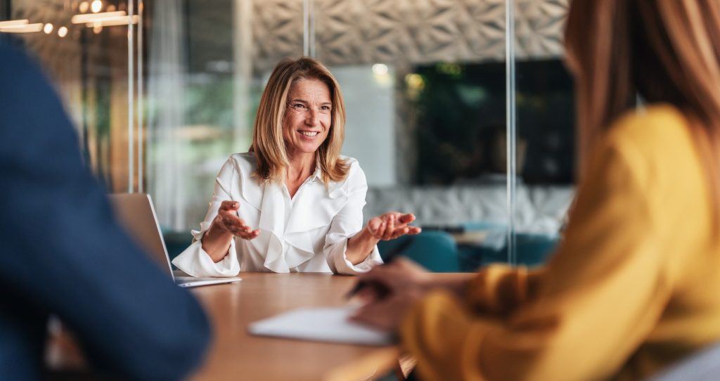 Businesswoman meeting with colleagues