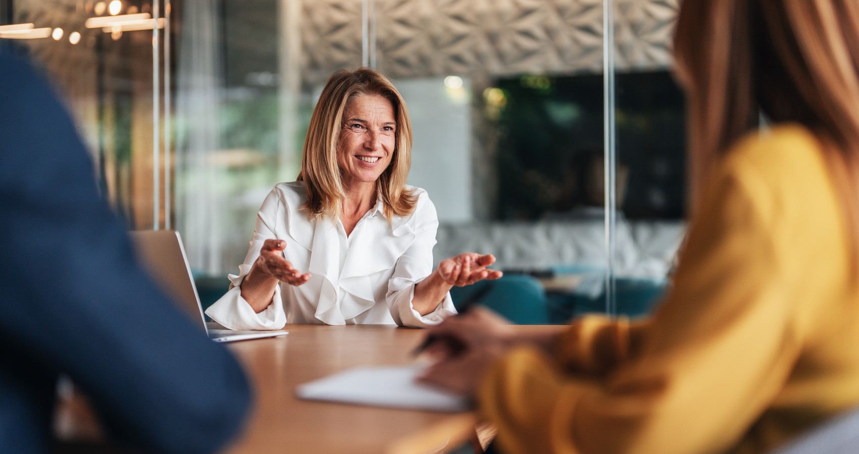 Businesswoman meeting with colleagues